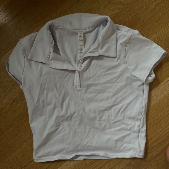 Alo Yoga Choice Polo in White - Picture 2 of 3